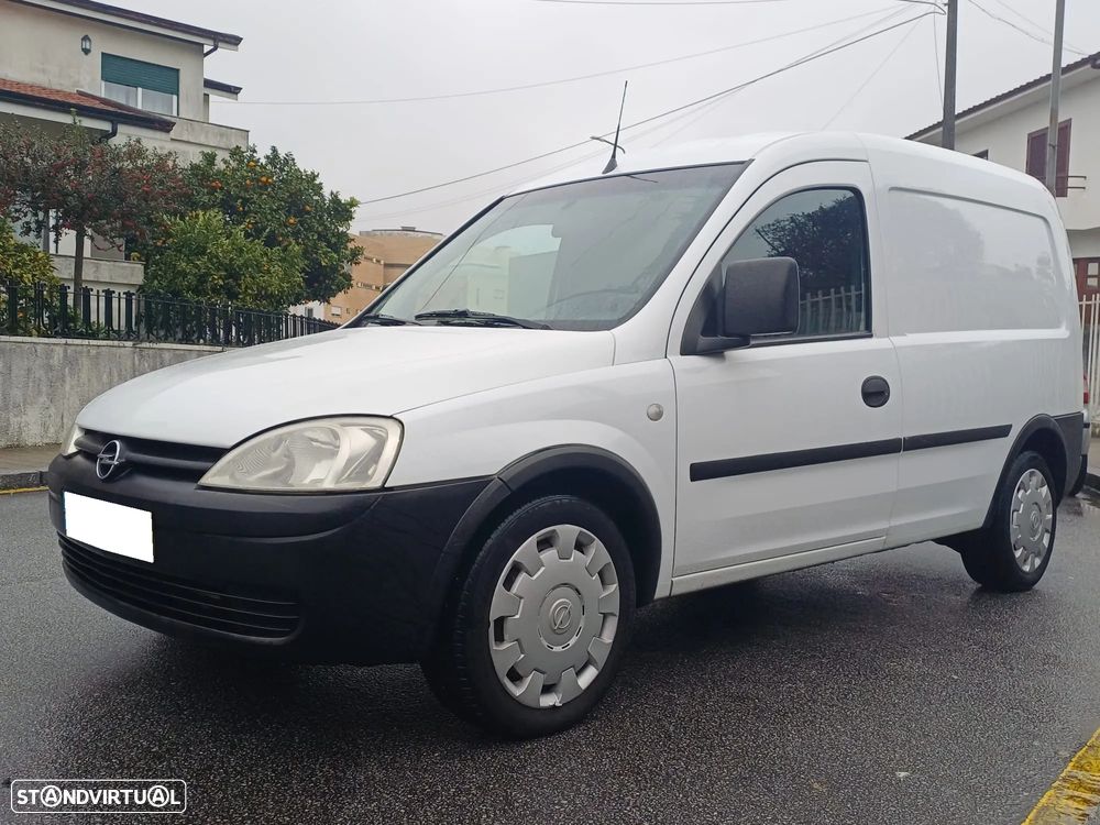 Opel COMBO 1.3 CDTI 75 CV - AR CONDICIONADO - 9