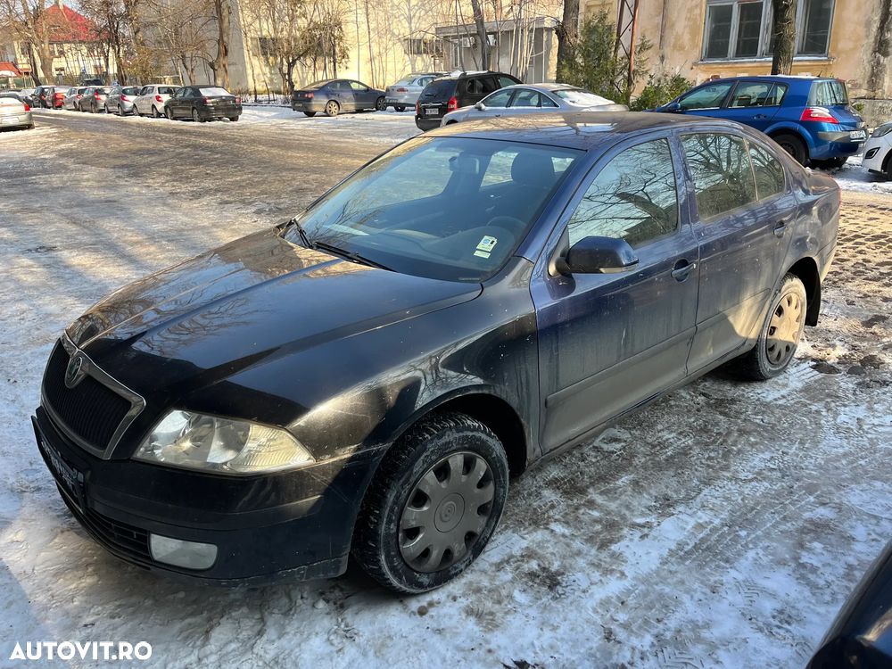 Dezmembrez Skoda Octavia 2 II 2007 albastru 1,9 TDI cod motor BXE - 7