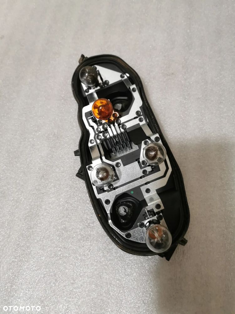 Opel Corsa D 3d Wkład lampy lewy tył - 1