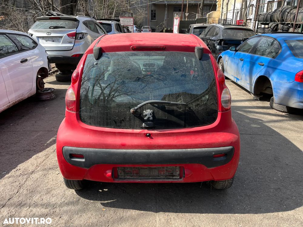 Dezmembrez Peugeot 107 rosu 2007 1.0 benzina 4usi - 14