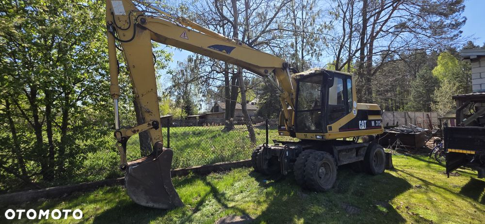 Caterpillar M 315 - 1
