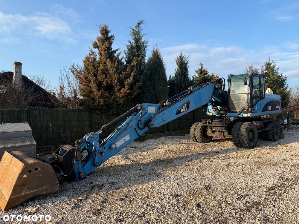 Caterpillar M322D - 1