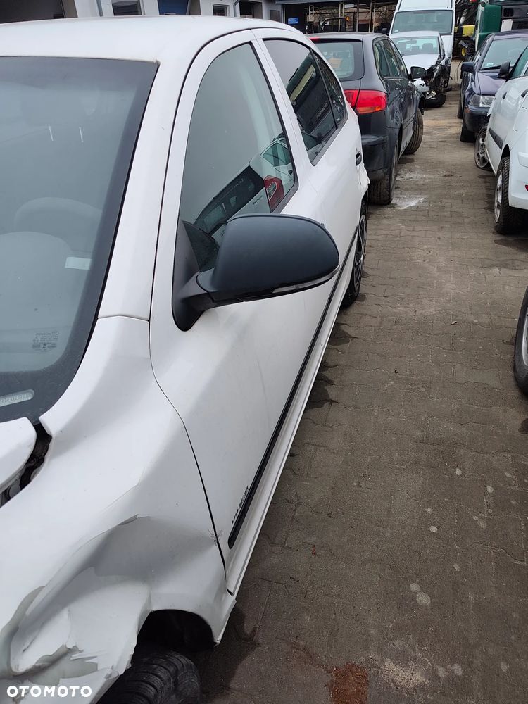 Skoda Octavia 2 II lift 2012 1,6 P 2006 r. 2,0 D na części podsufitka drzwi szyby lusterko zamek lampa itp - 11