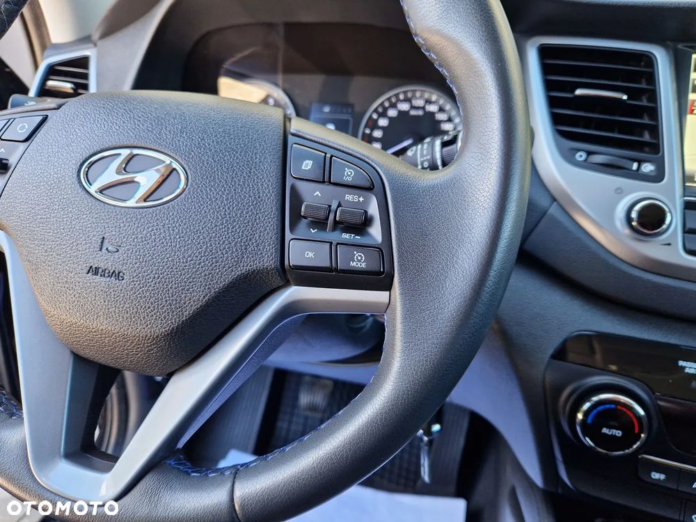 Hyundai Tucson blue 1.6 GDi 2WD Navi - 31