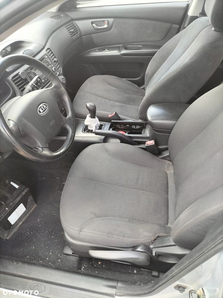KIA MAGENTIS II 2.0 144KM KOD 6C DRZWI PRAWY LEWY TYŁ PRZÓD KLAPA ZDERZAK PRZÓD TYŁ BŁOTNIK SZYBA LUSTERKO LAMPA SILNIK SKRZYNIA CAŁY NA CZĘŚCI - 8