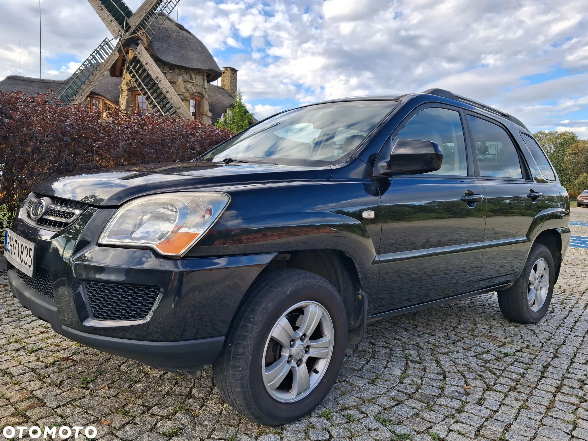 Kia Sportage 2.0 Tour - 1