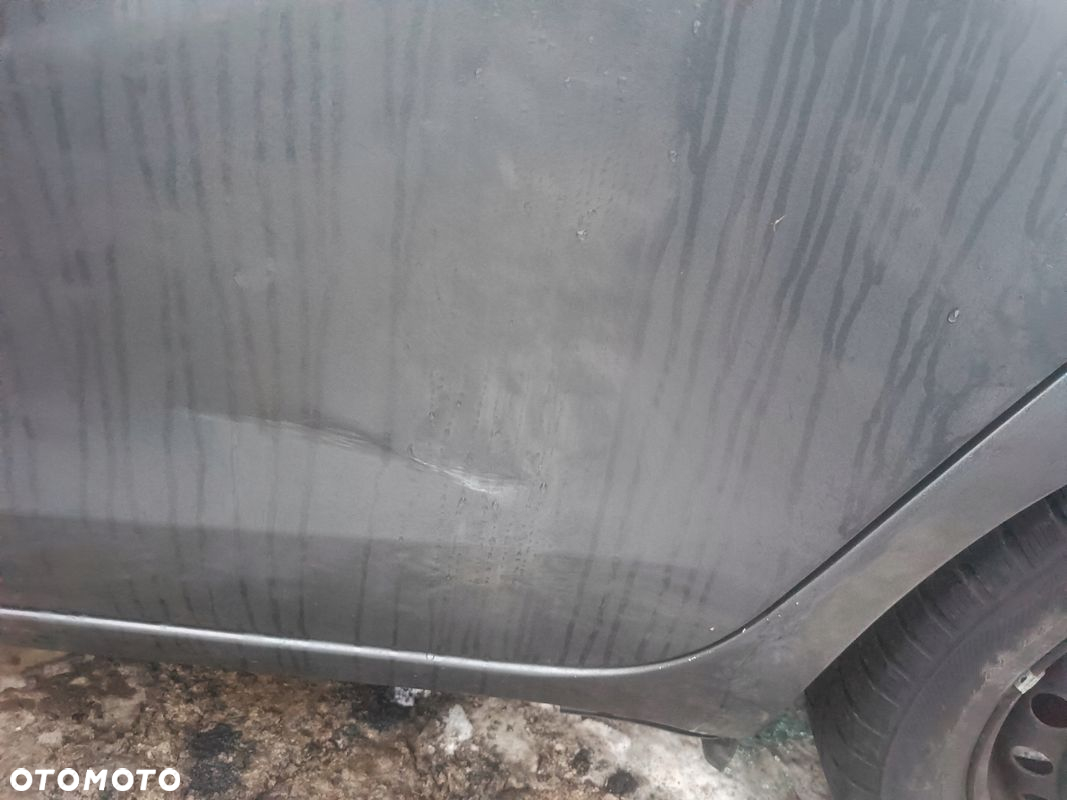 TOYOTA YARIS II LIFT DRZWI TYŁ LEWE 1G3 2010r - 2