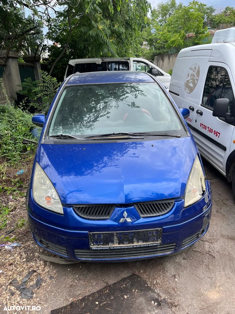Dezmembrez Mitsubishi Colt 2006 albastru 1,1 1,3 benzina 2006 - 5