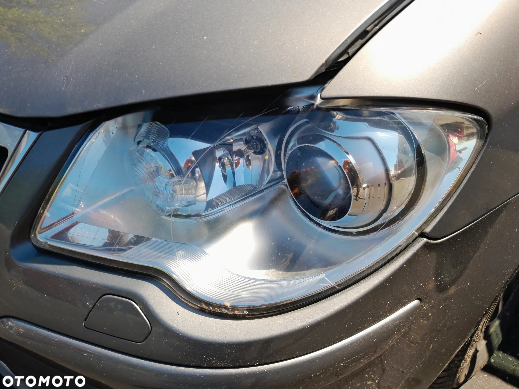 Lampa przednia lewa xenon VW Touran I lift 06-10r. - 5
