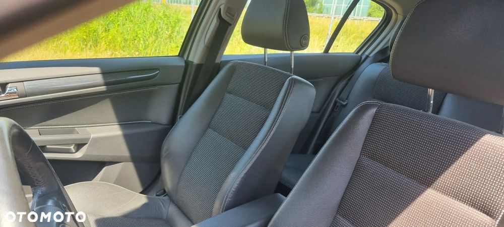 Opel Astra 1.8 Sport - 9