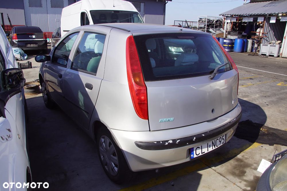 Auto na części - Fiat Punto II 1.2 8V 60 KM 188A4000 2003R Silnik Skrzynia Drzwi Maska Klapa Zderzak Błotnik Szyba Lusterko Deska Kokpit Sterownik Moduł Licznik Kierownica - 7