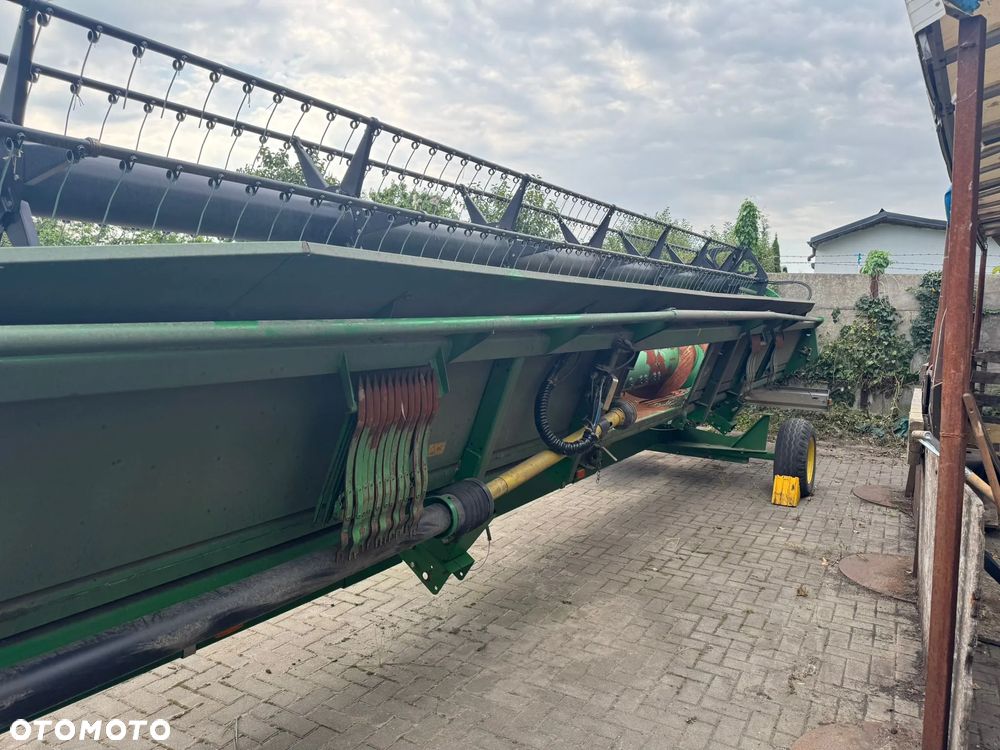 John Deere T670 - 24