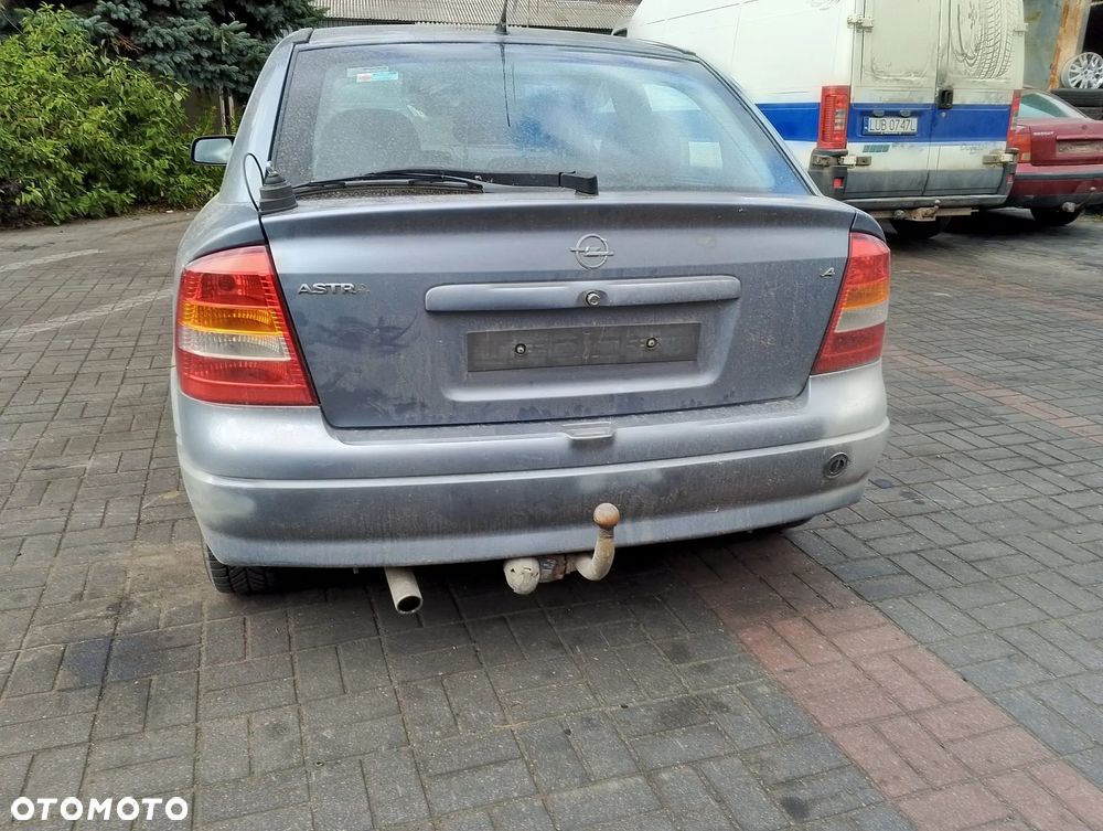Opel Astra G (04r.) 2.0 HDI 89KM. Silnik Z14XE Skrzynia MG4 lakier 163 / 4AU / GBJ - SILVER LIGHTNING.Cały na części. GWARANCJA !!!  Przód Tył Zestaw Komplet Drzwi Klapa Zderzak Błotnik Maska Grill Atrapa Szyba Pas Lampa Lusterko Boczki Fotel Kanapa Kokpit Deska Rozdzielcza Przełącznik Włącznik Sterownik Przewody Wiązka Instalacja Moduł Komputer Czujnik Listwa Pompa Alternator Wtryski Głowica Rozrusznik Kompresor Sprzęgło Dwumas Silnik Skrzynia ABS Klimatyzacji Paliwa Wspomagania Kolektor Turbina Przepustnica Zawór Chłodnica Koło Hak Belka Sanki Zawieszenie Mcpherson Półoś Amortyzator Wydech Tłumik Zacisk Most - 5