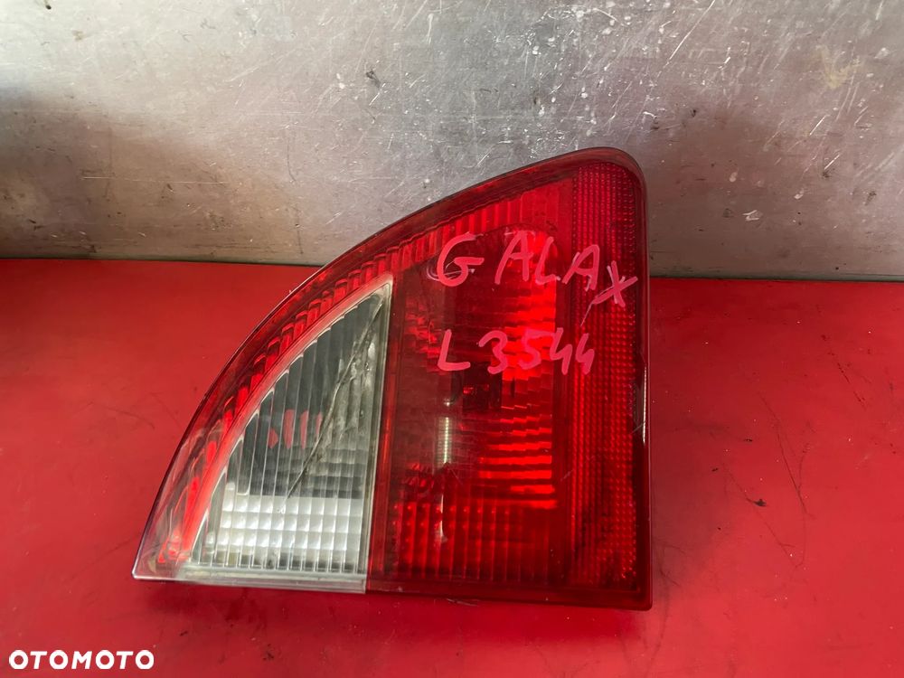 LAMPA LEWA TYLNA W KLAPIE FORD GALAXY  YM2113A603AB