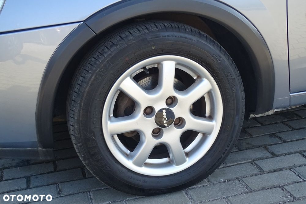 Opel Corsa 1.2 16V NJoy - 18