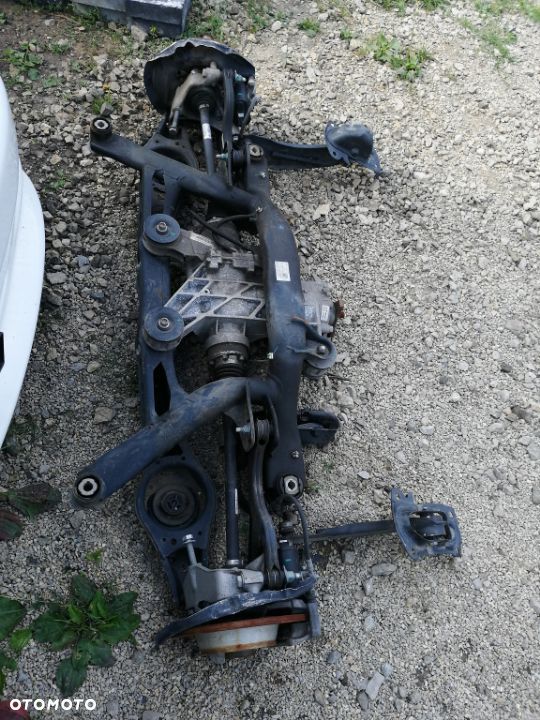 ZACISK TYŁ LEWY 4x4 AUDI Q3 10-15R 2.0 TDI - 1