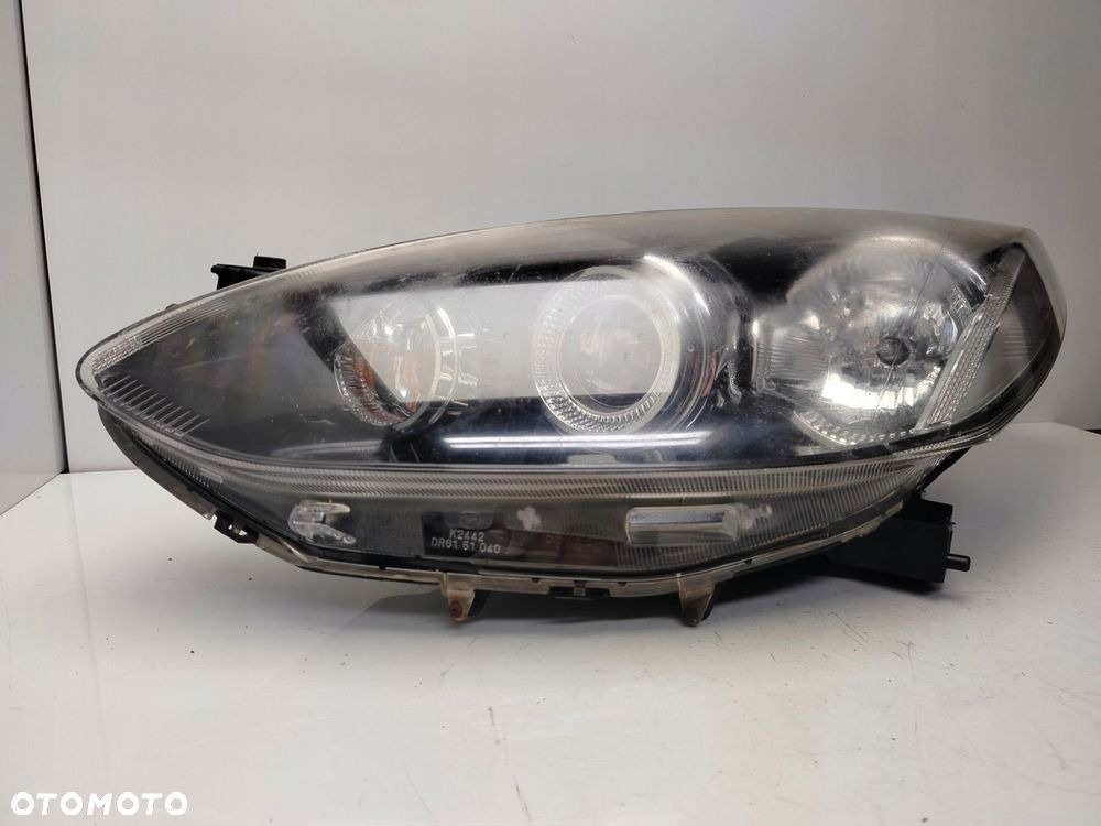 mazda 2 de 2011r reflektor lampa lewy przód lewa przednia soczewka - 4