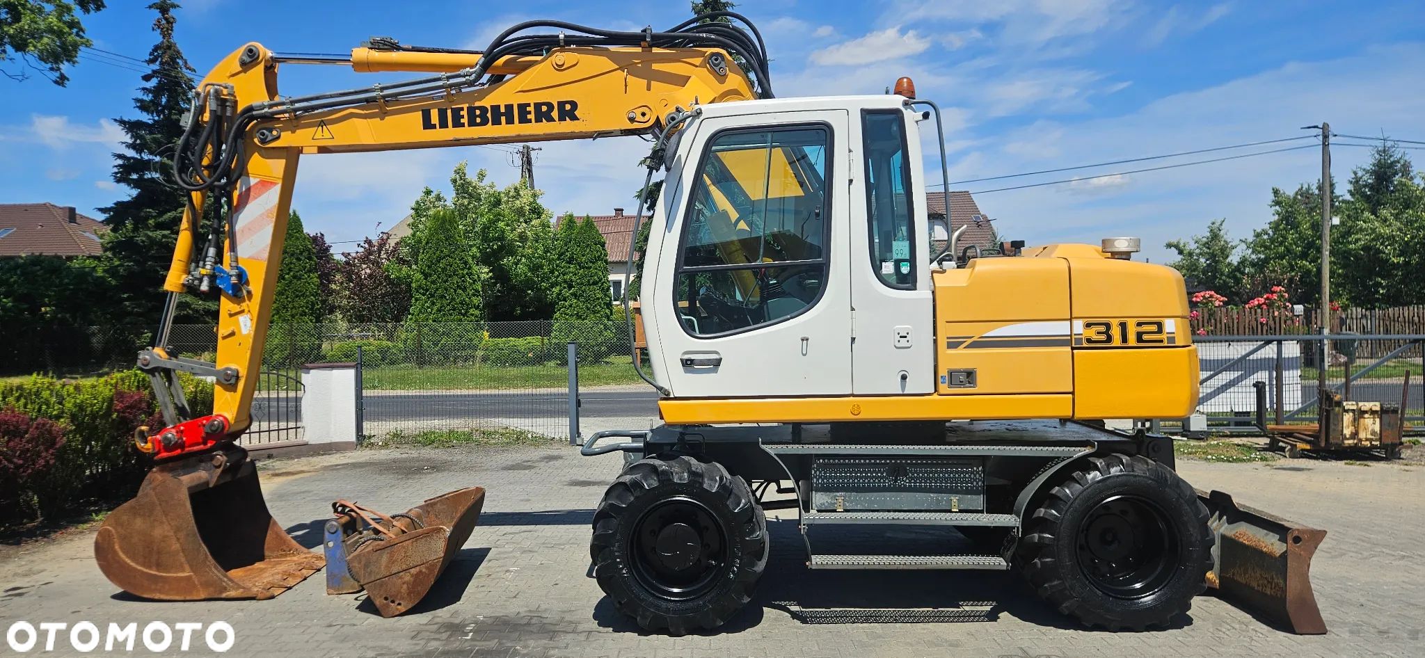 Liebherr A312 11 tys. Mtg centralne smarowanie z Niemiec! 2 łyżki - 1