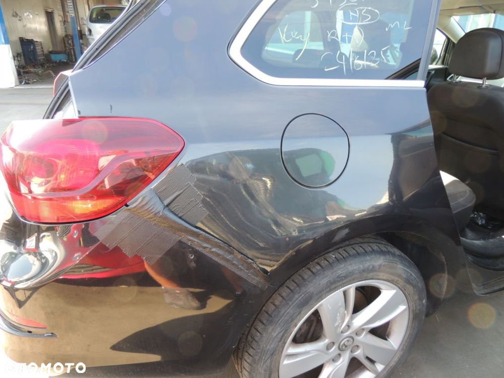 Ćwiartka nadwozia prawy tył Opel Astra J kombi '15 1.6 CDTI - 1