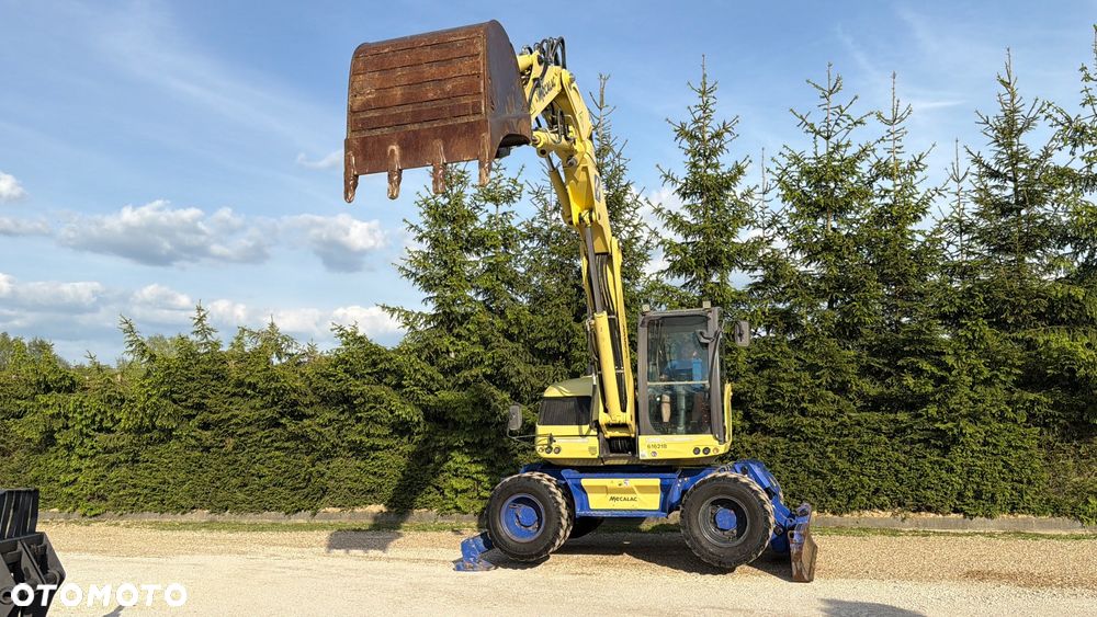 Mecalac Koparka 14 ton MECALAC 15 MWR koparko-ładowarka 3 łyżki widły 1 wł Centr.smarowanie Opony na BLIŹNIAKU 80%Camso ładowarka 714 12MTX 4x4 skrętne KLIMA kabina Premium silnik 146KM volvo EW140B DEUTZ szybka 35km/h - 34