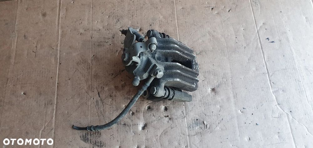 Zacisk hamulcowy lewy tył tylny lewy VW Polo V 6R - 1