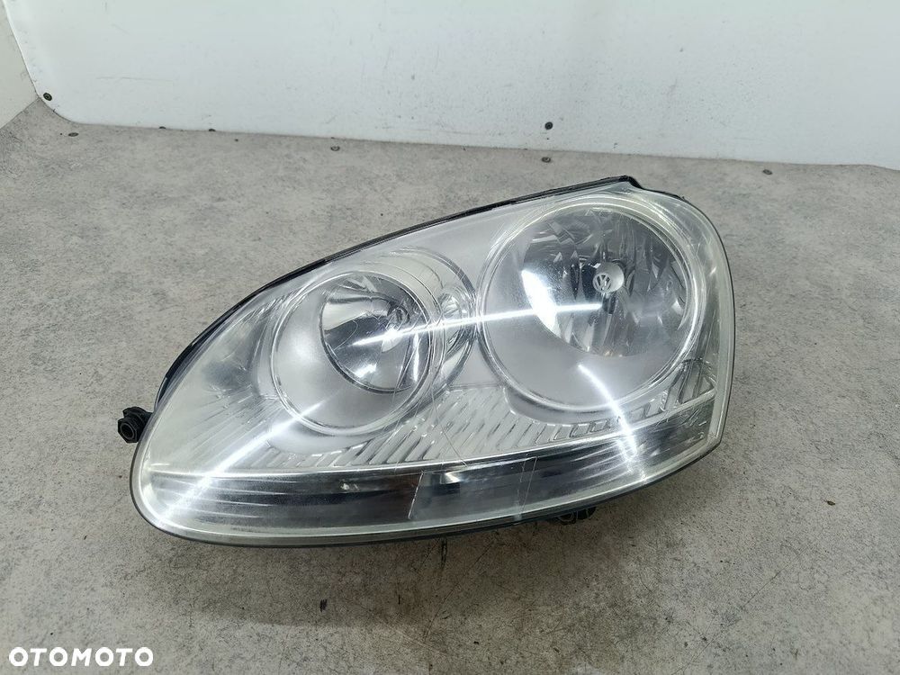 LAMPA PRZÓD LEWA VW GOLF V 1K6941005P  1EG247007-07  HELLA - 2