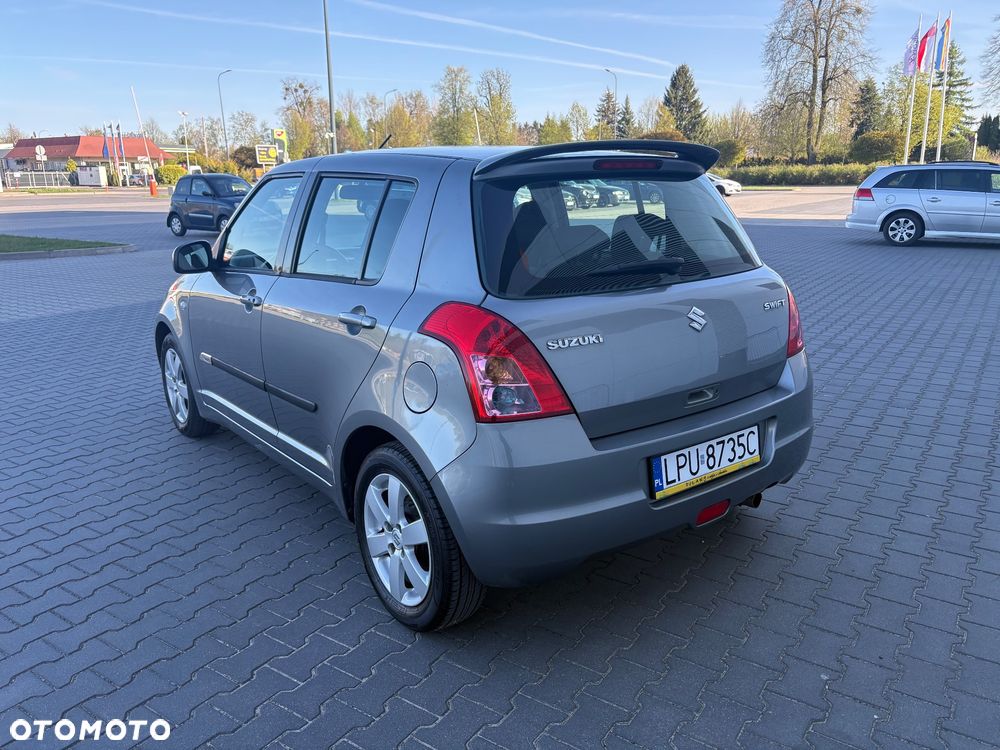 Suzuki Swift 1.3 Sakura - 7