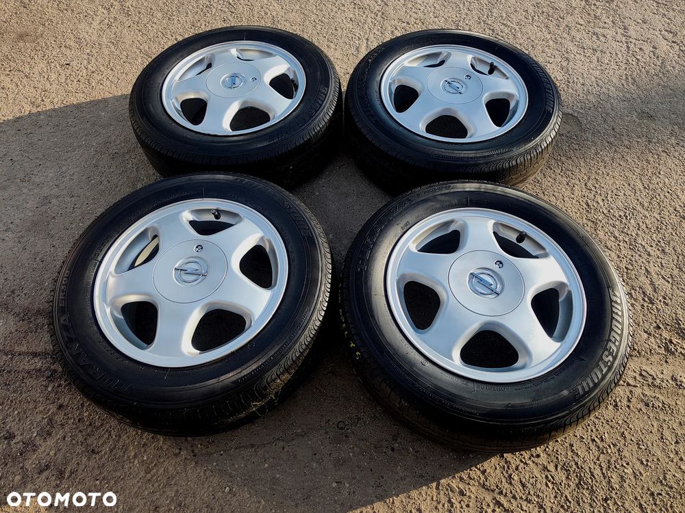 4x100 Felgi Aluminiowe Alufelgi Oryginalne 15 Koła Letnie Lato OPEL ASTRA G H CALIBRA COMBO C CORSA B C D VECTRA A B TIGRA KARL KADETT 4mm Legnica ALU-RAD 195/65 - 2
