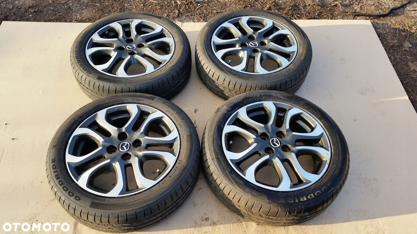 Felgi aluminiowe Mazda OE 9965405560 5.5" x 16" 4x100 ET 40 Z OPONAMI - 2