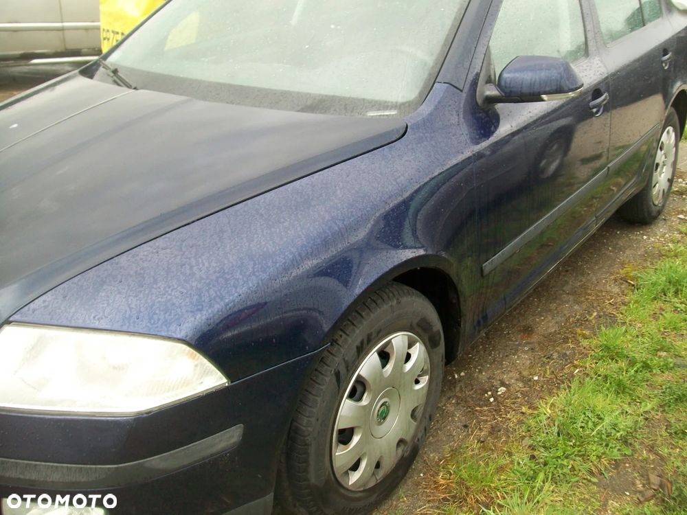 BŁOTNIK LEWY PRZEDNI OCTAVIA 2 - 1