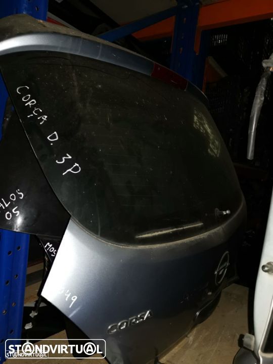 OPEL CORSA D 3P TAMPA DA MALA  M049 - 1