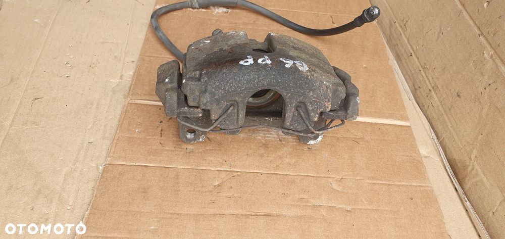 Zacisk hamulcowy prawy przód VW Passat B6 - 4