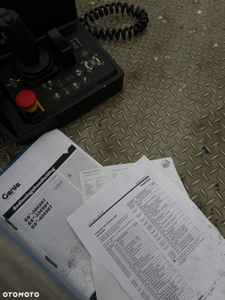 Genie Zwyżka Terenowa GS-4069RT Podnośnik Nożycowy Dźwig 14,5 metra jak Nowa z salonu! 960 mtg. 2013 rok, Pochodzi z Norweskiego urzędu Komuny. Zadbana! 4x4 Silnik Kubota. Zero Luzów i wycieków. Aktualne Serwisy DEKRA BMWT. Wysuwany Balkon. Sterowana z dołu i góry. Okazja Tanio !! Dokumentacja! Bez DPF, adBLUE - 23