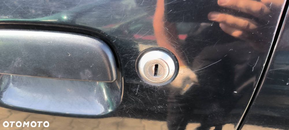 DRZWI LEWE PRZÓD SUZUKI IGNIS 2001 - 7