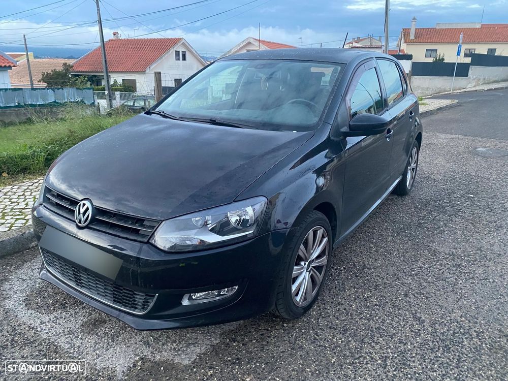 VW Polo 1.6 TDI Confortline BlueMotion - 14