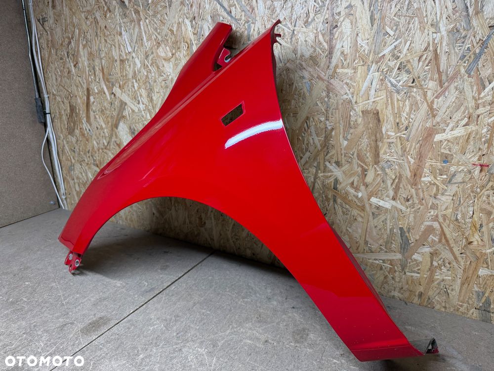 BŁOTNIK LEWY PRZÓD LEWY PRZEDNI OPEL CORSA E CZERWONY 50B - 29