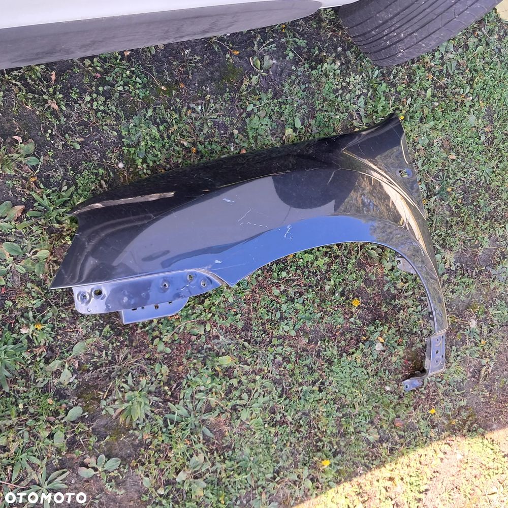 Błotnik lewy przód Dacia Duster 10 -17 przedni OE oryginał - 5