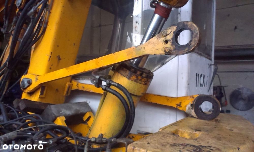 MECALAC 11 , 12 MXT - CZĘŚCI - Ramie , Sworznie , Kiwak Manipulator , Siłowniki , Łapy Stabilizatory - 10