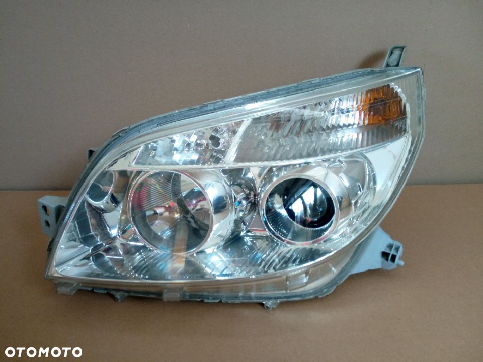 Daihatsu Terios lewy reflektor EUROPA - 1