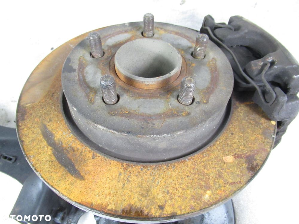 WAHACZ TYLNY LEWY FORD FOCUS MK2 II - 2