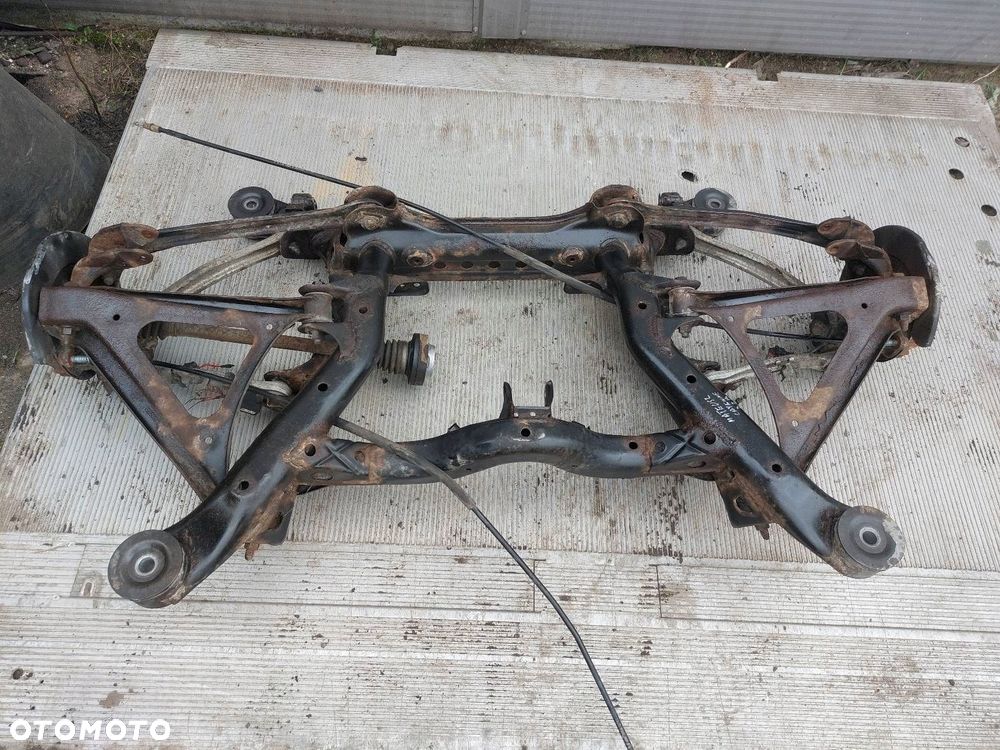 BELKA OŚ ZAWIESZENIA TYŁ PORSCHE CAYENNE I 02-10r 3.2 V6 - 2