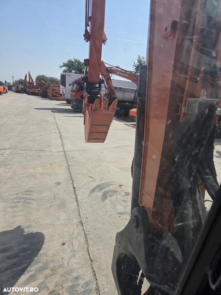 Hitachi ZX85, 8,65 tone, Ad sapare 5m, 2022, 2.427 ore, CUPLA RAPIDA HIDRAULICA+3 CUPE NOI, inst picon pe brate, latime 2,2m, senile cauciuc 90% ok, aer conditionat, computer, reviziile efectuate, ridica aprx 4 tone, leasing 4 ani, CA NOU-PROMOTIE 62.900 EUR - 34