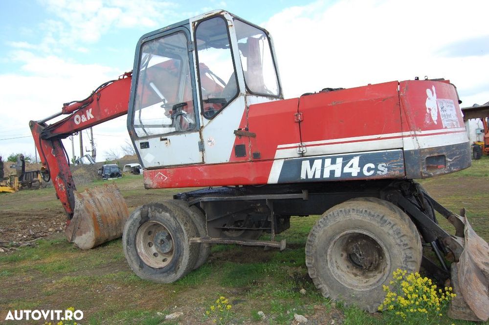 Dezmembrez O&K MH 4 cs - 1