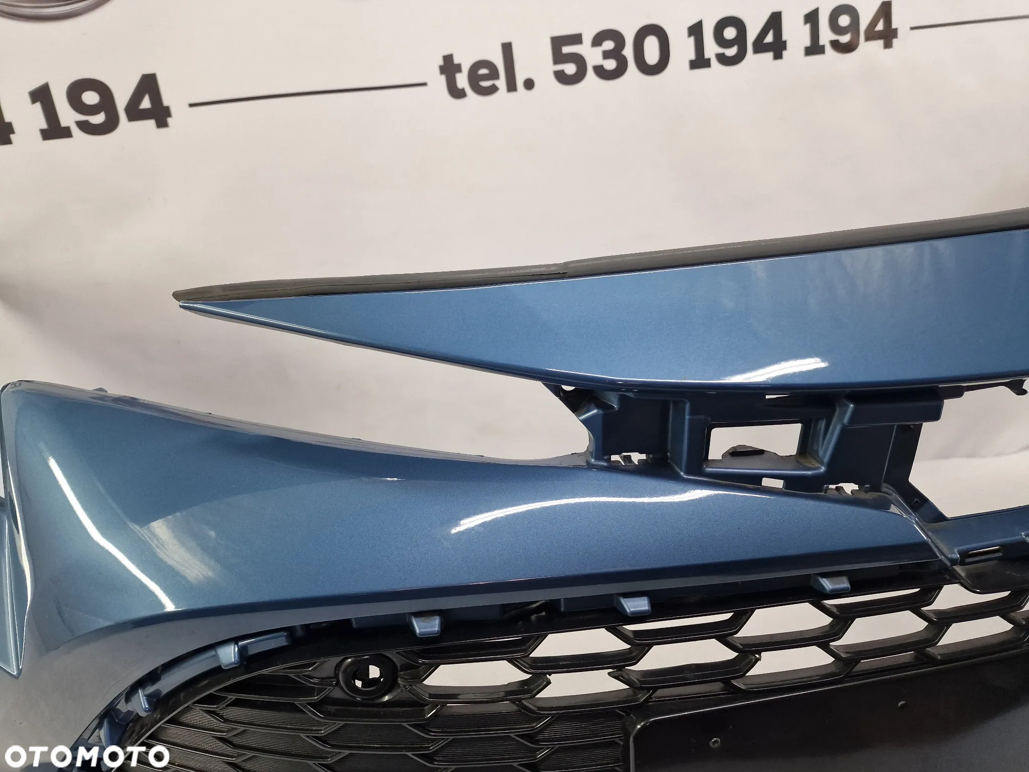 TOYOTA COROLLA XII E21 18- ZDERZAK PRZEDNI PRZÓD NA SPRYSKI + 6X PDC + KRATKA ŚRODKOWA , KOLOR BŁĘKITNY METALIK , NR 52119-02P40 / 52119-02S20 , NR AUKCJI NZ938 - 13