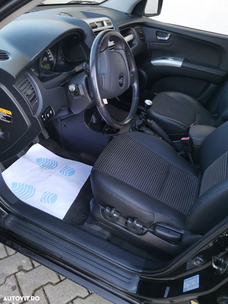 Kia Sportage 2.0 CRDI 4WD Cup - 12