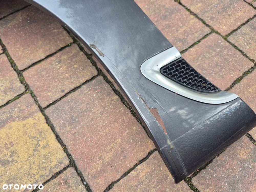 blotnik lewy przod saab 95 ng 10-12 - 2