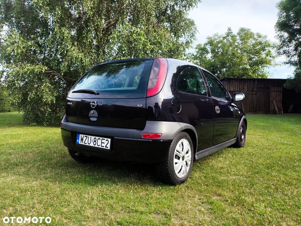 Opel Corsa 1.2 16V Cosmo - 5
