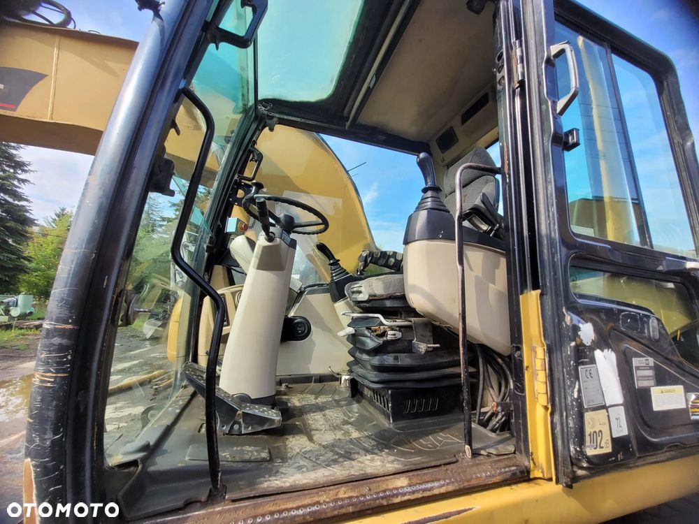 Caterpillar M316C - 7