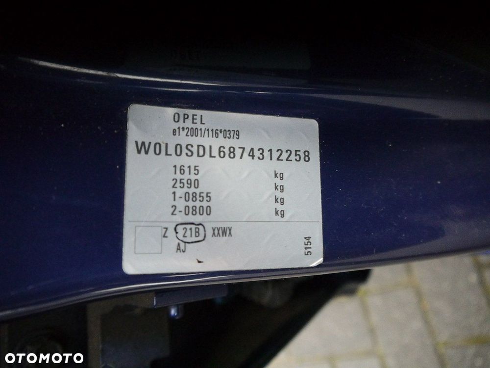 Opel Corsa 1.4 16V Cosmo - 24