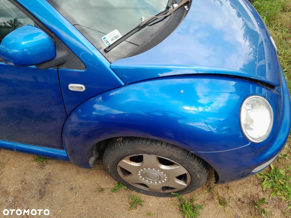 Błotnik przedni prawy VW New Beetle 97-05r. LW5Y - 2